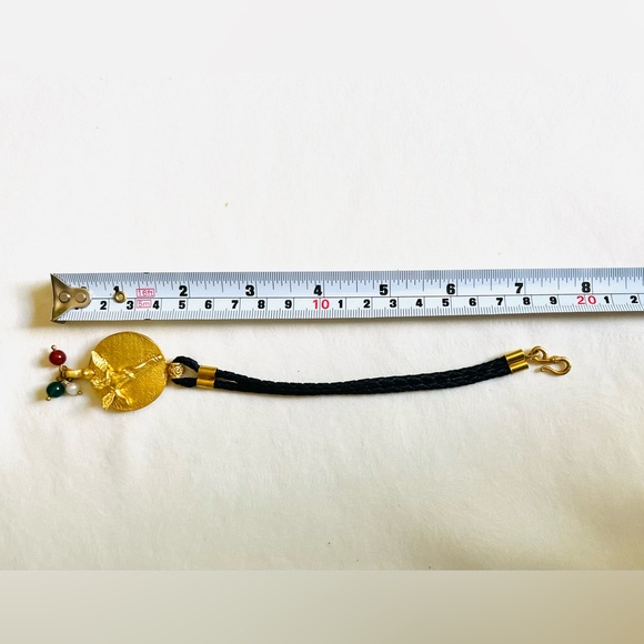 Black rope & gold tone real silver bracelet with beautiful baby cupid figurine - Picture 9 of 12